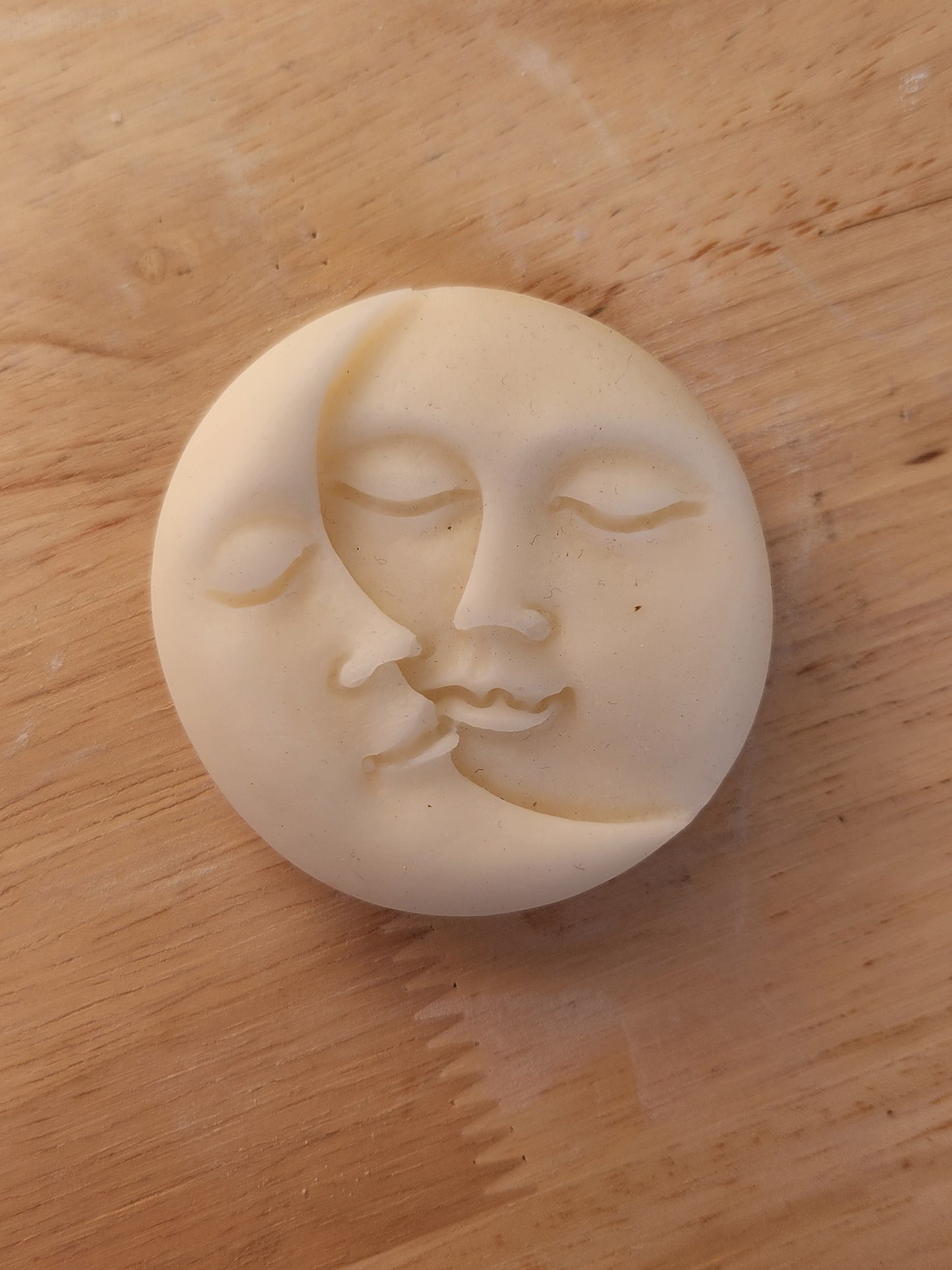 Sun and moon candle