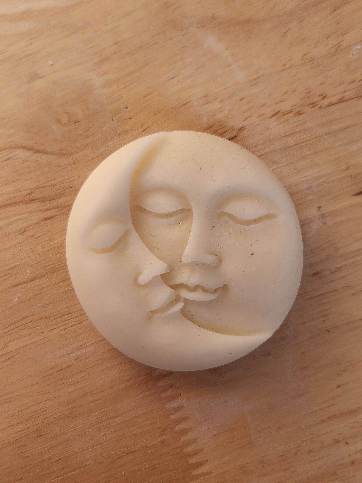 Sun and moon candle