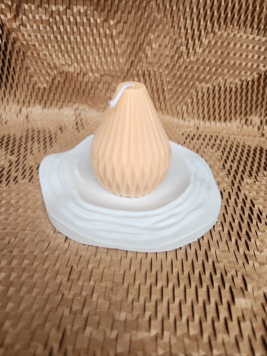 Pear-shaped candle