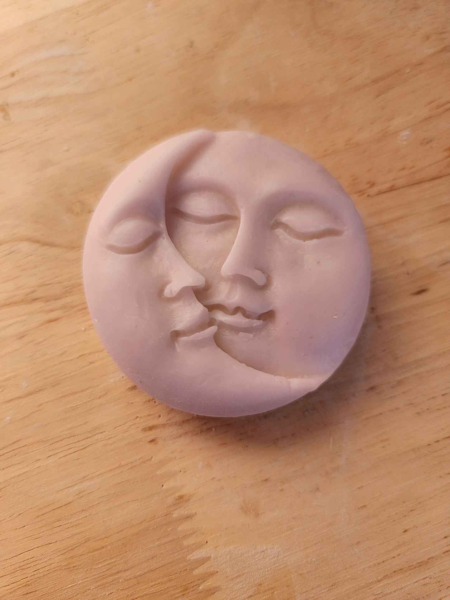 Sun and moon candle