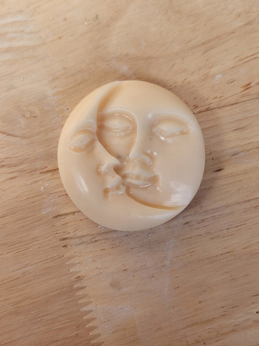Sun and moon candle